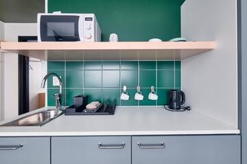 Фото номера Large Triple Room with Kitchenette Отель GreenStar Hotel Jyväskylä г. Йювяскюля 3