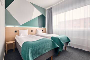 Фото номера Стандартный трехместный номер Отель GreenStar Hotel Jyväskylä г. Йювяскюля 5