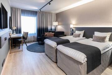 Фото номера Standard Family Four Отель Scandic Jyväskylä Station г. Йювяскюля 2