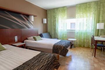 Фото номера Семейный номер Отель Scandic Jyväskylä City г. Йювяскюля 5