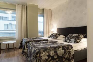 Фото номера Двухместный номер с 2 отдельными кроватями Отель Hotel Milton г. Йювяскюля 2