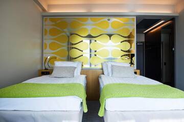 Фото номера Двухместный номер с 2 отдельными кроватями Отель Solo Sokos Hotel Paviljonki г. Йювяскюля 7