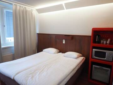 Фото номера Семейный номер Отель Omena Hotel Jyväskylä г. Йювяскюля 3