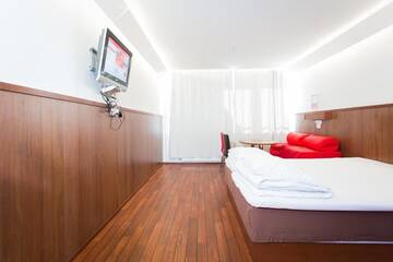 Фото номера Семейный номер Отель Omena Hotel Jyväskylä г. Йювяскюля 24