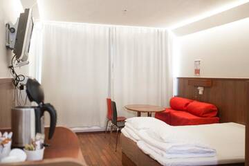 Фото номера Двухместный номер с 1 кроватью Отель Omena Hotel Jyväskylä г. Йювяскюля 10