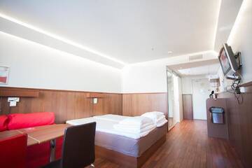 Фото номера Двухместный номер с 1 кроватью Отель Omena Hotel Jyväskylä г. Йювяскюля 11