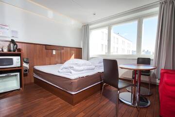 Фото номера Двухместный номер с 1 кроватью Отель Omena Hotel Jyväskylä г. Йювяскюля 14