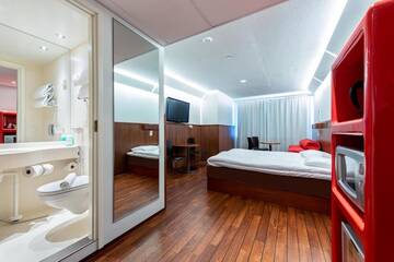 Фото номера Семейный номер Отель Omena Hotel Jyväskylä г. Йювяскюля 14