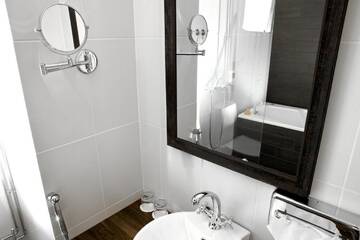 Фото номера Двухместный номер с 1 кроватью или 2 отдельными кроватями Отель Boutique Hotel Yöpuu г. Йювяскюля 10