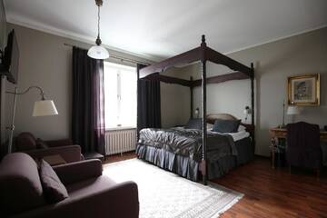 Фото номера Улучшенный двухместный номер с 1 кроватью Отель Boutique Hotel Yöpuu г. Йювяскюля 12